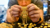 রেকর্ড ছোঁয়ার পর বিশ্ববাজারে স্বর্ণের দামে বড় পতন