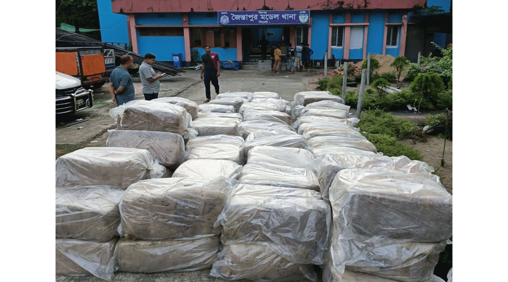 সিলেটে বালুর নিচে মিলল কোটি টাকার শাড়ি